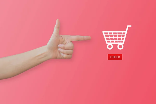 Shopping Online Concept Handgebaren Wijzen Naar Winkelwagen Pictogram Roze Achtergrond — Stockfoto