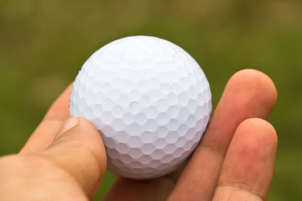 Balle de golf sur la main — Photo