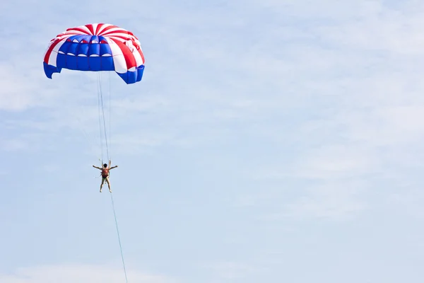 Parachute on sky background — Stock Photo, Image