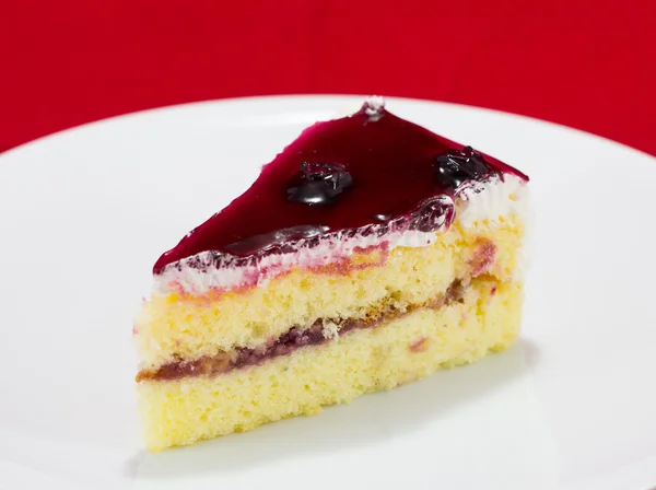 Delicious slice of blueberry cake — Stock Photo, Image