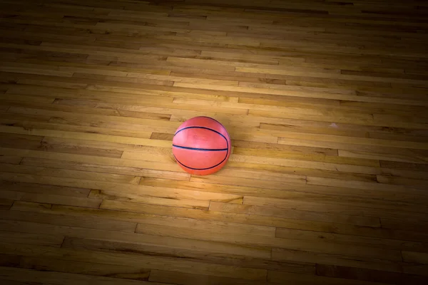 Bola de basquete sobre o chão — Fotografia de Stock