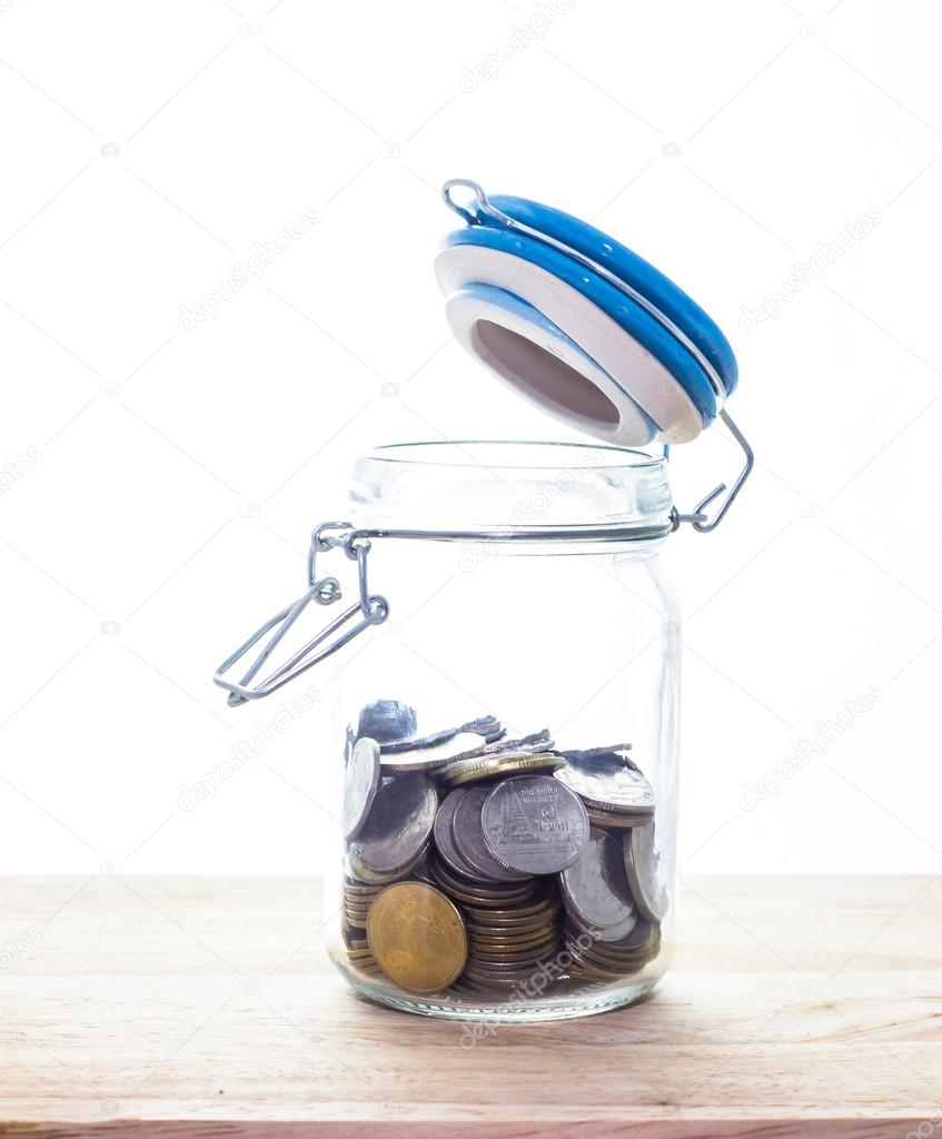 coin into glass jars 