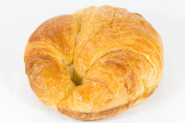 Croissant auf weißem Hintergrund — Stockfoto