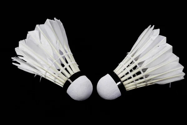 Badminton shuttlecock no fundo preto — Fotografia de Stock