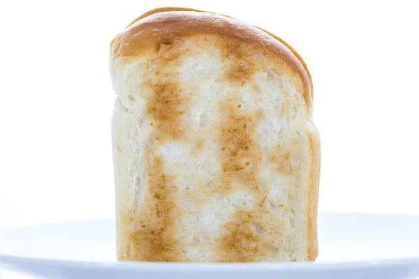 白色背景上的烤的面包 — 图库照片