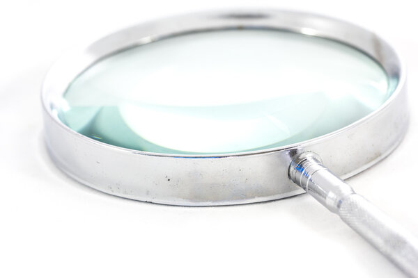 magnifying glass on white 