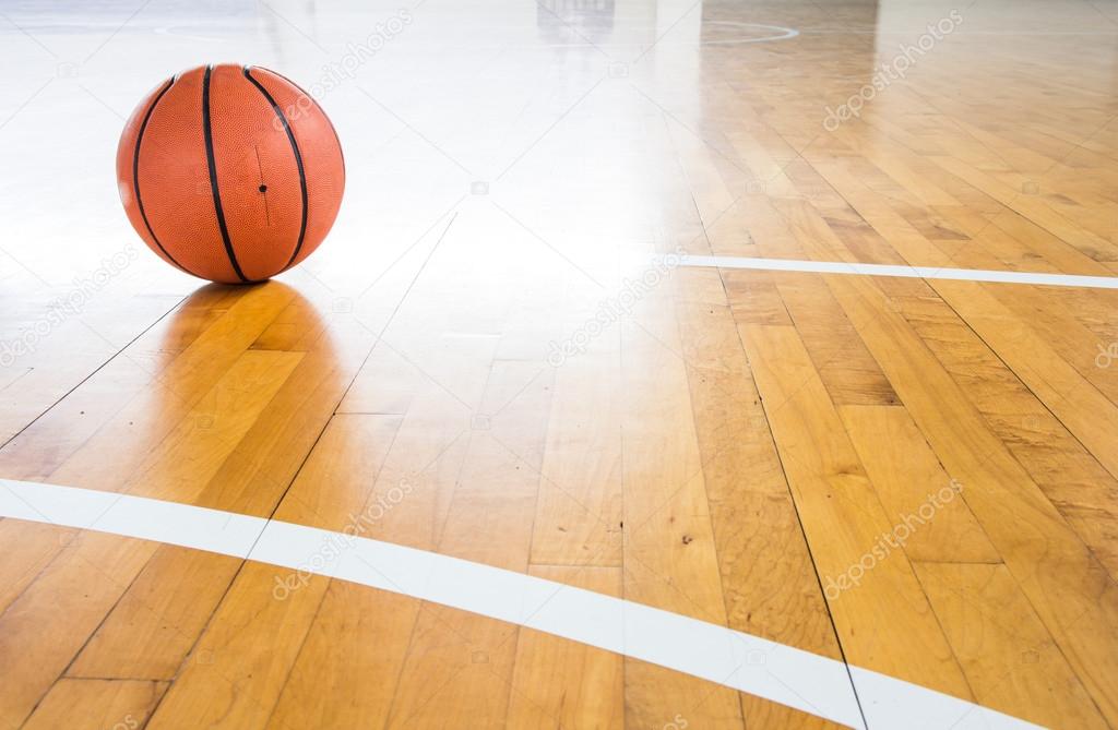 Basketball ball over floor