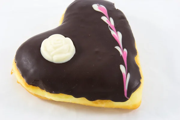 Закрыть шоколадный пончик — стоковое фото