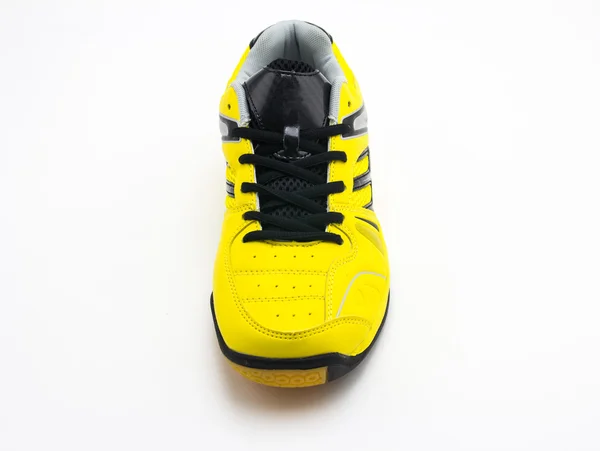 Желтая спортивная обувь — стоковое фото