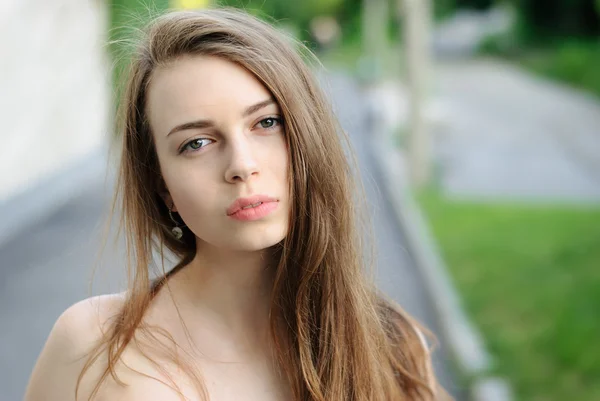 Closeup portrait of charming sad girl outdoor — Stock Photo, Image