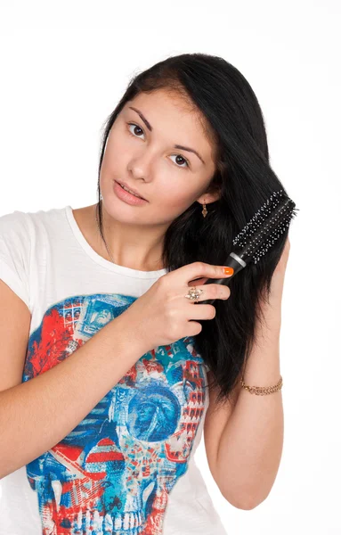 Beautiful girl makes the hairstyle — Stock Photo, Image