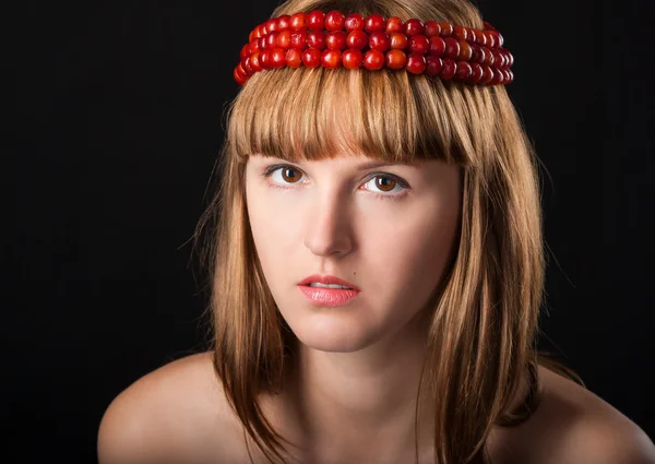 Close-up portrait of beautiful girl in chaplet — Stock Photo, Image