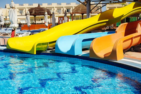 Multicolored slides water park on a sunny day — Stock Photo, Image