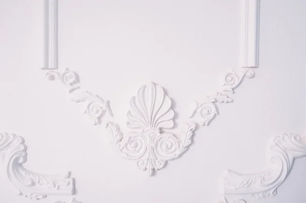 Stucco element of architectural decoration on the wall — Stock Photo, Image