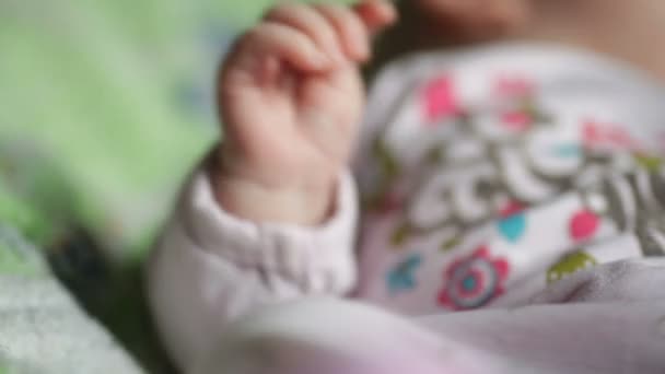 Beautiful little baby girl lying on the bed — Stock Video