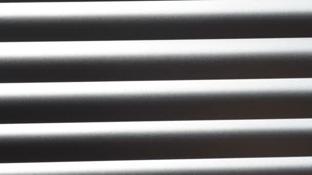 Texture closed aluminum blinds in the office — Stock Video