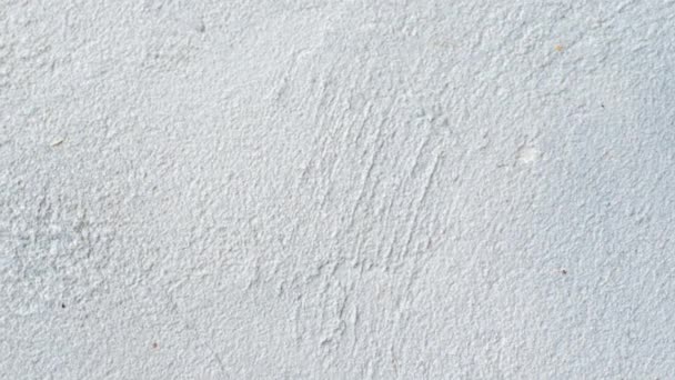 Fondo blanco vintage o grueso de cemento natural o piedra vieja textura como una pared de patrón retro. Es un concepto de banner de pared, grunge, material, construcción envejecida con espacio para el texto. Imágenes de vídeo — Vídeos de Stock