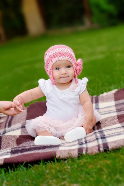 Beautiful 4 month old baby girl in pink flower hat and tutu — Stock Photo, Image