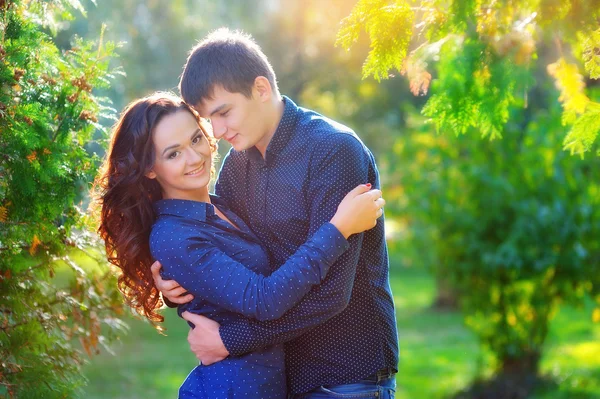 Beautiful happy couple embracing — Stock Photo, Image