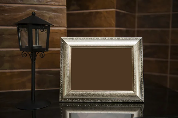 Blank silver picture frame at the desk with clipping path — Stock Photo, Image