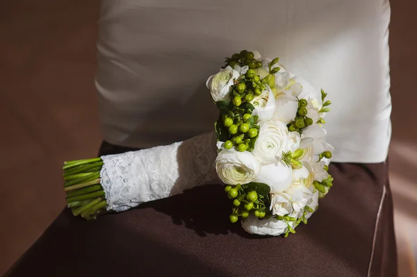 Bridal bouquet lying on the chair — Stock Photo, Image