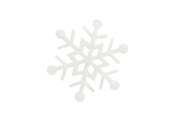 Sneeuwvlok gemaakt van vilt op een witte achtergrond — Stockfoto