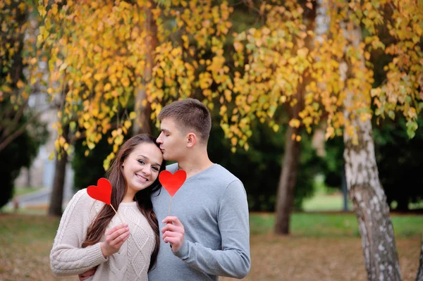 Man and woman are holding heart — Stock Photo, Image