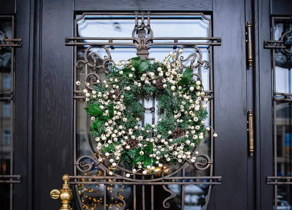 Christmas wreath on the door — Stock Photo, Image