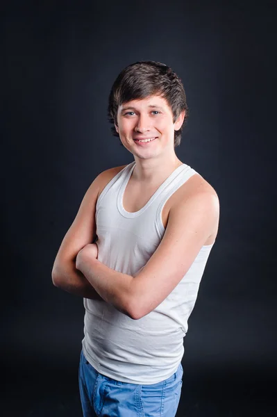 Happy portrait of a man on a black background Royalty Free Stock Images