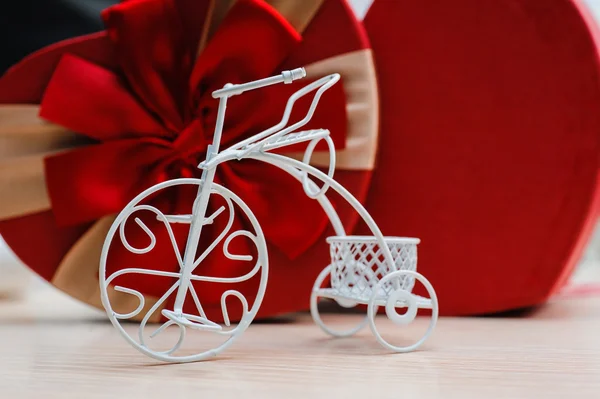 Small white decor forged bike — Stock Photo, Image