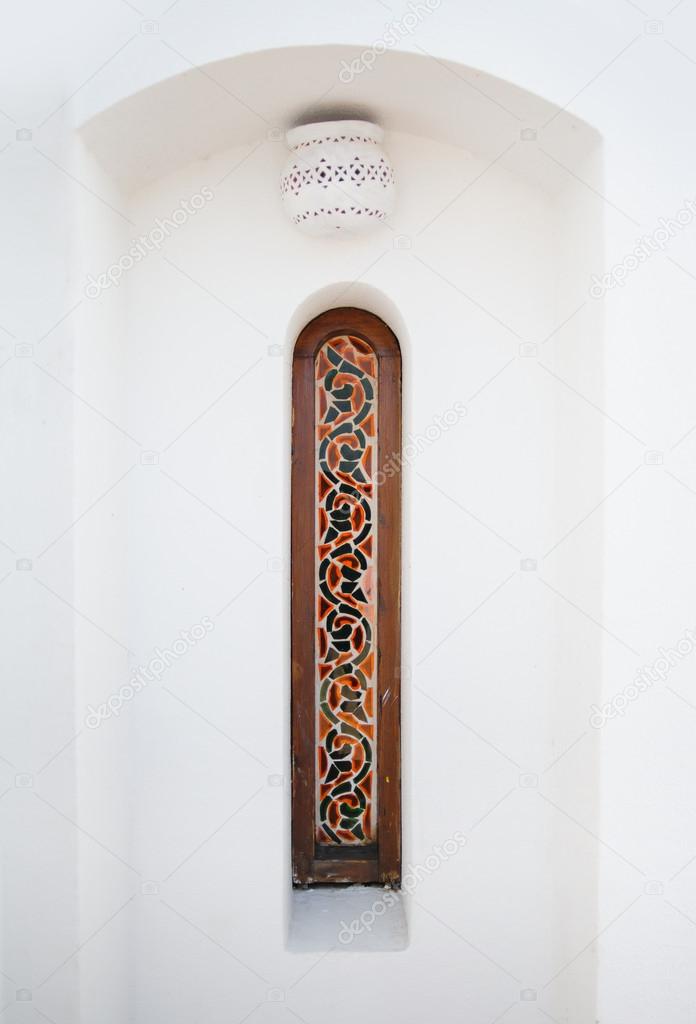 Arab narrow window with stained glass