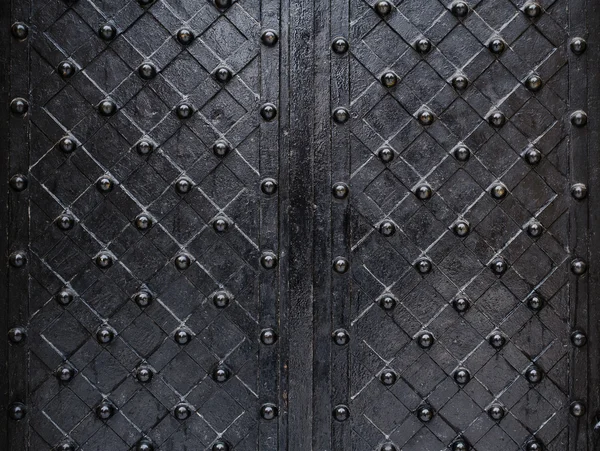 Metallic texture black elements of the old door — Stock Photo, Image
