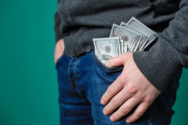 Dollar in der Hosentasche der Jeans — Stockfoto