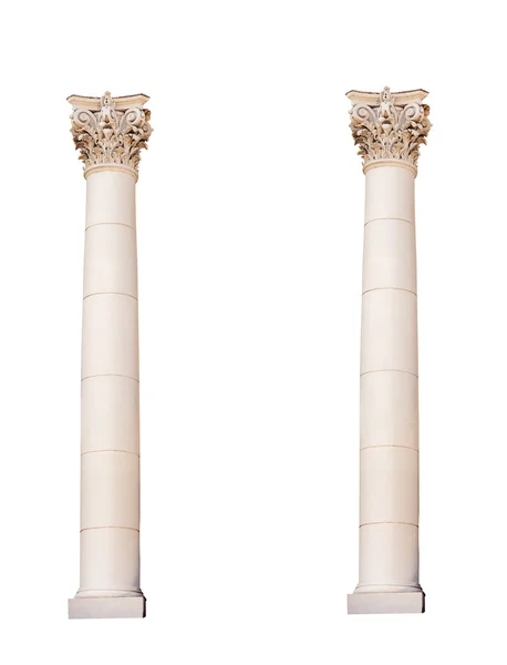 Deux colonnes anciennes isolées sur fond blanc — Photo