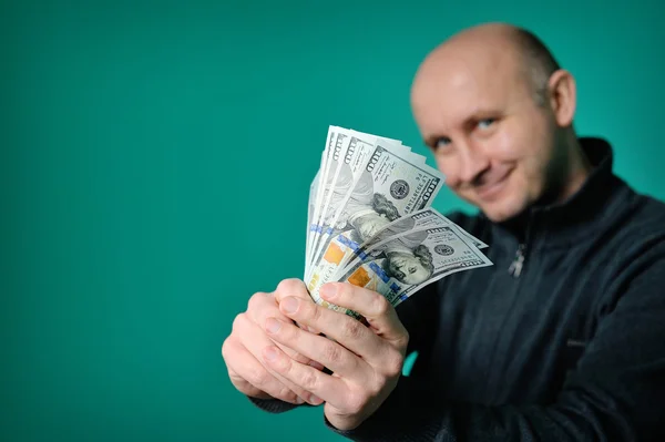 Business Man Displaying a Spread of Cash — Stock Photo, Image