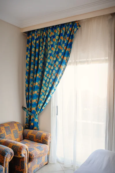 Beautiful curtains and chairs in the room — Stock Photo, Image