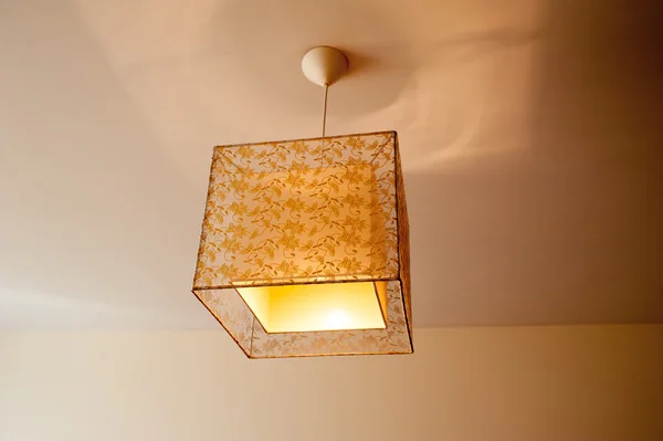 Beautiful lamp on the ceiling in the bedroom — Stock Photo, Image