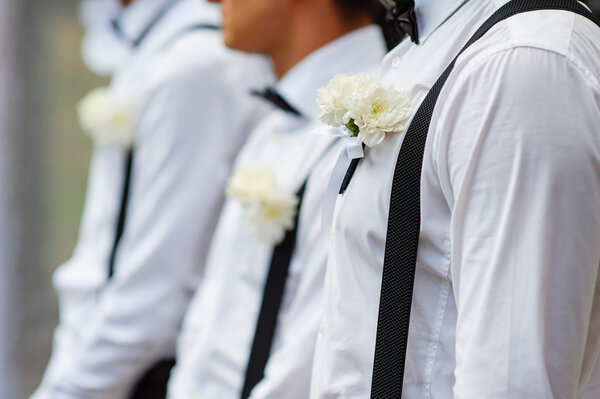 Groom With Best Man And Groomsmen At Wedding