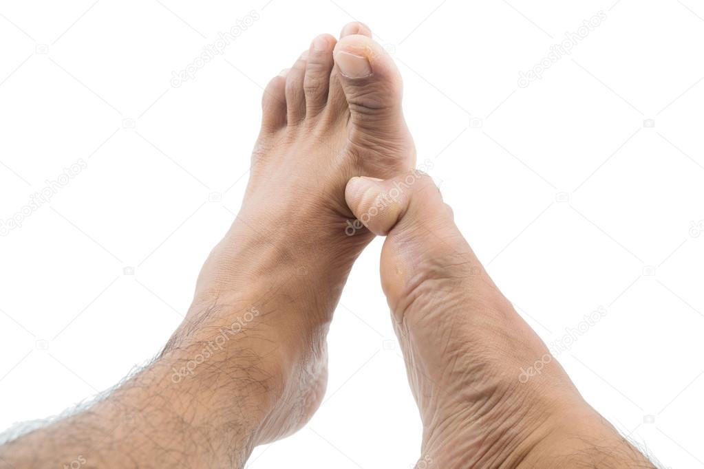 Itchy feet uses his big toe to scratch his other foot — Stock Photo