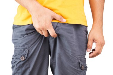 Man scratch the itch with hand, Penis