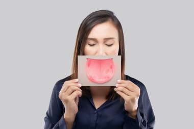 The woman show the picture of tongue problems, Illustration benign migratory glossitis on a brown paper, Behcet's Disease clipart