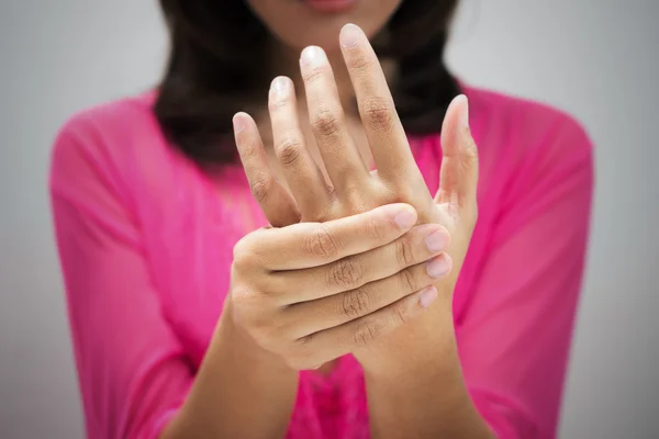 Acute pain in a women wrist — Stock Photo, Image