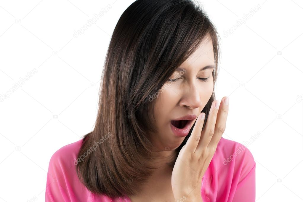Yawning tired woman isolate on white background