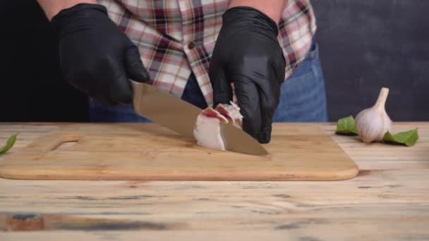A man cuts salted lard with a sharp knife — Stock Footage Man Cuts Salted Lard Sharp Knife Stock Footage