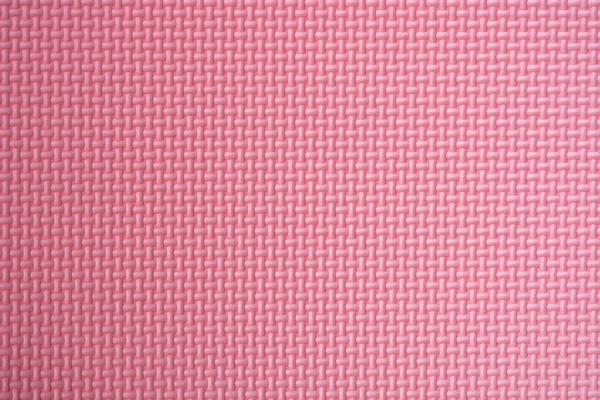 Light pink surface texture of floor mat