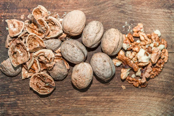 Shelled walnut on wooden table — Stock Photo, Image