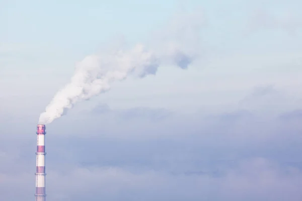 Chimney with industrial smoke . Environmental pollution by co2