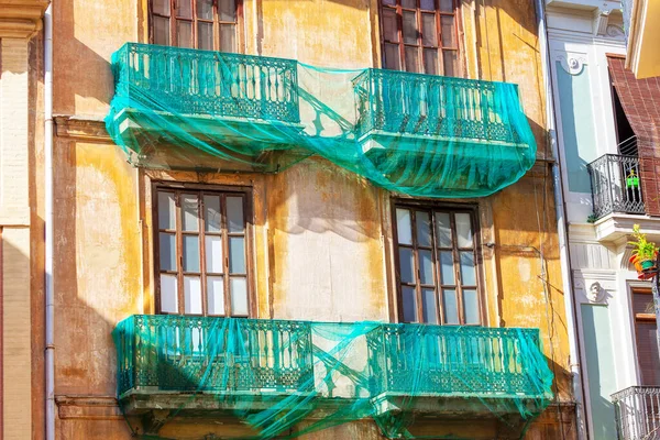 Restoration of old residential house with balcony