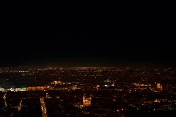 Aerial view of Paris in the night . France capital city in the nighttime . European big city in the night illumination