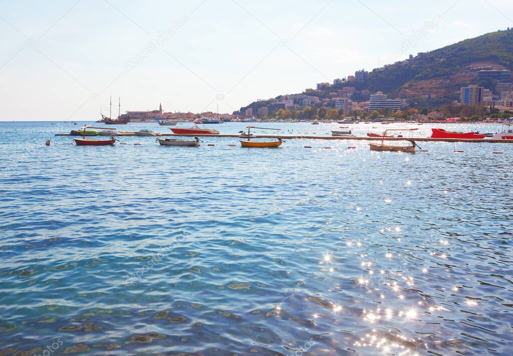 Boats in Budva Riviera . Tourist Resorts and Hotels on the Adriatic Sea Coast in Montenegro 